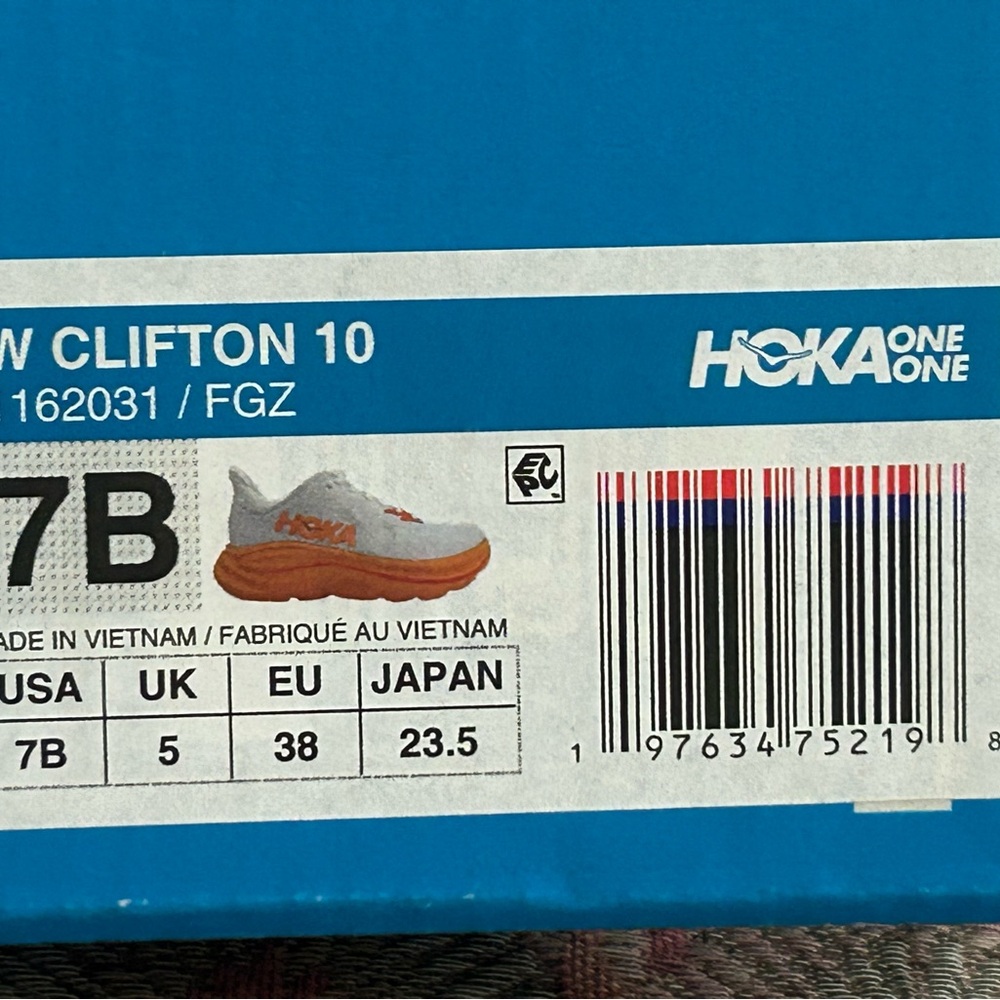 Hoka One One White Sneaker with Orange Accent - Picture 2 of 8